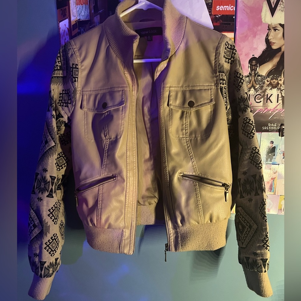 New look// Tan leather jacket with print.